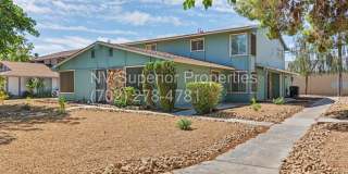 SE!! Close to UNLV!! 2 Bedroom 2 story!! 1 Car Carport!! Fully Furnished!! Community Pool!! and Tennis Courts!! Gallery 1