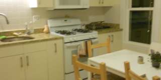 Huge 4 bedroom unit with A/C, in-unit laundry and parking in Oak Square! Gallery 1