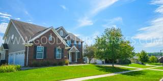 4 Bedroom 4 Bath Executive Home in West Des Moines with a fenced in yard and a 3-car garage Gallery 1