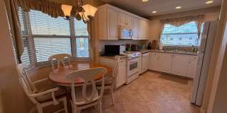 Furnished 2 BR , 2 Bath condo - with Heated Pool and Security Gate Gallery 11