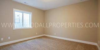 Spacious 4-Bedroom Clive Ranch with Finished Basement & 3-Car Garage Gallery 13