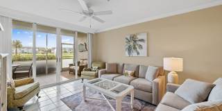first-floor unit featuring a 2 bedroom, 2 bath fully furnished Gallery 11