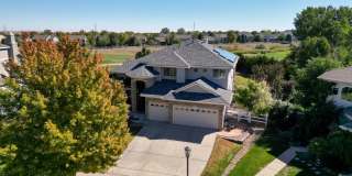 Long Realty & Property Management - Wonderful 6 Bedroom Home Backing to a Golf Course Gallery 1