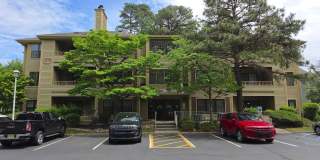 Rare opportunity! Furnished 2nd fl condominium boasting 2 large bedrooms, 2 full bathrooms, formal dining room, fireplace, storage room & utility room with washer/dryer Gallery 1
