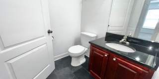 MOVE IN NOW!! Gated community Miriada! 1st floor 1X1.5 bath condo near pool area!!! Laminate wood flooring in living area and carpet in bedroom! Has washer & dryer! Gas stove & water heater! Gallery 23