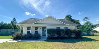 Welcome to this charming 3 bedroom 2 bathroom home in Leland Gallery 1