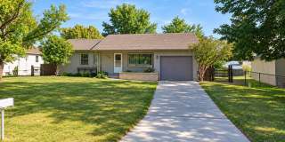 Charming 4-Bedroom Home with Fenced Yard & Garage Gallery 1
