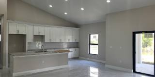 Brand-New Luxury Home with Office, 3-Car Garage & Designer Upgrades | Modern Living in Cape Coral! Gallery 9
