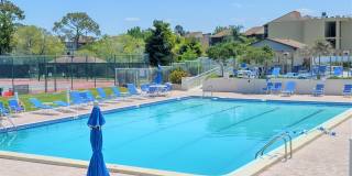 Bird Bay Village Annual Rental – Furnished 1st Floor Unit with Covered Parking Gallery 4