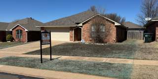 Charming 3 bedroom home with storm shelter in Norman! No carpet and a large pantry! Gallery 1