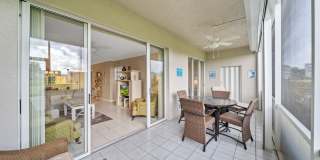 first-floor unit featuring a 2 bedroom, 2 bath fully furnished Gallery 18