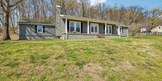 Experience the perfect blend of privacy and open space in this beautifully maintained 3-bedroom, 2.5-bath ranch home Gallery 1