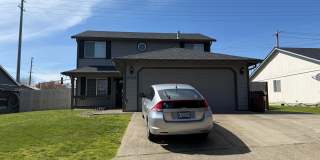 Spacious 4-bdrm/2.5-bath Hillsboro home. Fenced yard w/ covered deck, 2-car garage, great location Gallery 3