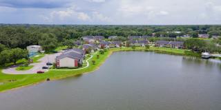 1/1 in the Heart of Brandon with a lake view! Gallery 19