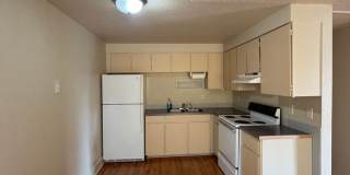 2bdrm, 1 bath lower level apartment close to parking and shopping with flexible month to month lease Gallery 1