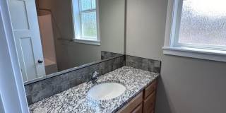 4 Bedroom / 4 bath New Townhome. Every bedroom is its own Master Suite with your own full bathroom, walk in closet and A/C unit. Full-size washer and dryer in your unit. Gallery 24