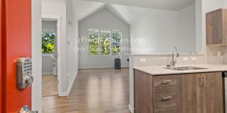 One Bedroom Condo in the Heart of North Bethany - Top Floor with Vaulted Ceilings! One Bedroom Condo in the Heart of North Bethany - Top Floor with Vaulted Ceilings! Gallery 1