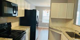 End unit 3 story townhome! Great location, large deck, swimming/tennis/playground, large rooms, must see! Gallery 9