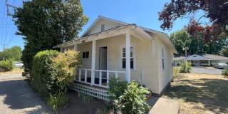 Charming 2-Bedroom Home with Open Living Space and Tile Flooring Gallery 1