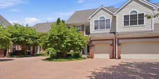 Beautiful Belle Aire Townhome with Finished Basement, Garage & Pool Gallery 1