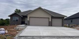 Beautiful, brand-new, 3-bedroom, 2-bath home in Nixa with a 3-car garage. Gallery 1