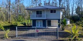 3BR/2BA Two-Story Home in Ainaloa – Fenced  Gated Gallery 1