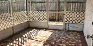 Beautiful 2/2/1 1150 Sq. Ft. with BONUS ROOM!!... tile & luxury plank flooring, Frest paint and a large fenced in yard! Gallery 21