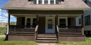 Comfortable Akron Home with Covered Front Porch, Dining Room & 2-Car Garage Comfortable Akron Home with Covered Front Porch, Dining Room & 2-Car Garage Gallery 1