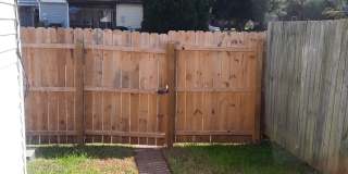 Three bedroom townhome with small, fenced-in patio/ yard area. Gallery 1