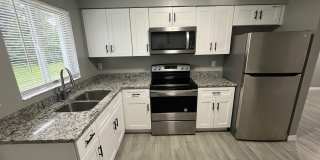 ** COMPLETELY REMODELD UNFURNISHED 2/1 DUPLEX AVAILABLE FOR MOVE-IN NOW 2024 ** ONE SMALL DOG FRIENDLY ** Gallery 1