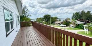 Downtown Clermont - Beautifully Renovated 2-Bed/1-Bath Upstairs Unit with Stunning Lake Minneola Views- Gallery 9