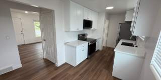 Remodeled 4 Bed, 2 Bath with Double Kitchen & Covered Carport Gallery 1