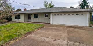 Single Story Home with Granite Counters and Large Utility Room ~ 2970 Phipps Gallery 1