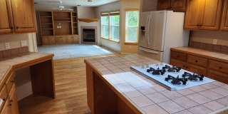 $500 move-in special_Spacious Country Club Home | 3-Car Garage + Basement Bonus Area Gallery 3