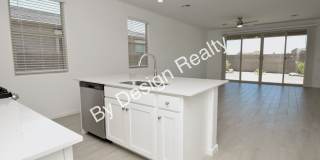Modern 3 Bedroom 2 Bath Gladden Farms Home with 3-Car Tandem Garage Gallery 10