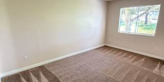 2BR/1BA Lakeside ground floor condo with 1 car detached garage, 1 uncovered parking space & community pool. Gallery 11