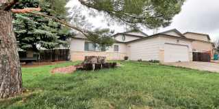 4-Bedroom Home Near CSU | Fenced Yard  2-Car Garage Gallery 1