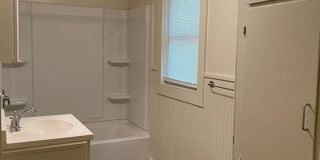 **Available Immediately** 4 bedroom / 1 bath home located near Washburn University Gallery 8