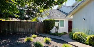 House like 2bed/1.5 Bath Condo with Spacious Corner Yard and 2 Car Garage Gallery 1