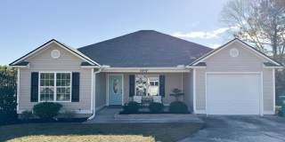 Spacious 3BR Home with Open Split Layout, Fenced Yard  Covered Front Porch Gallery 1