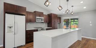 Updated 4BR Corner Lot Home with Finished Basement & 2-Car Garage Gallery 6