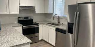 Beautifully Updated 2 Bed Townhome with Pool Access Gallery 1