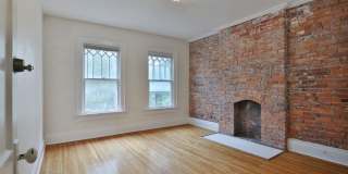 Charming 5-Bedroom Home with Exposed Brick and Modern Upgrades Gallery 32