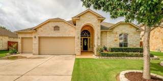 Beautiful one story stone home in Estates at Settlers Park Gallery 1
