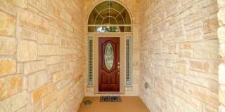 Beautiful one story stone home in Estates at Settlers Park Gallery 3