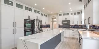 Luxury 5-Bedroom Home in Guard-Gated Community with 3-Car Garage Gallery 11