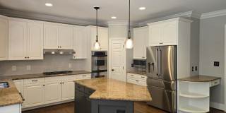 Custom Brick Home on Private Wooded Lot in Cary's Prestigious Wessex Community Gallery 7