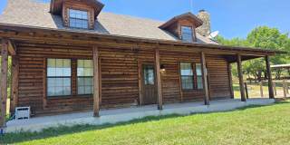 **MOVE IN SPECIAL** 3/2 LOG CABIN FOR LEASE NEAR ALEDO, WEATHERFORD, AND AZLE! Gallery 1