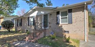 Available late August! Adorable + updated 3 bedroom home with fenced yard, 10 minutes from Downtown Durham! Gallery 1