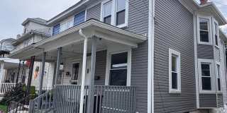 Twin home with updated kitchen, washer/dry on first floor, private back yard and porch. Gallery 1